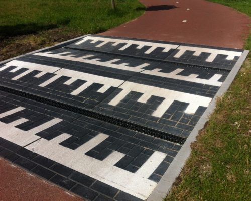 Verkeersdrempel-steenmotief-fietspad-draingoot-Zoetermeer-01